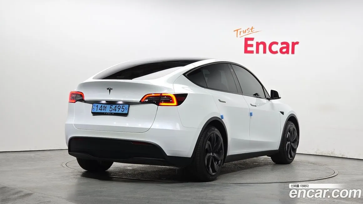 Tesla Model Y — фото 5