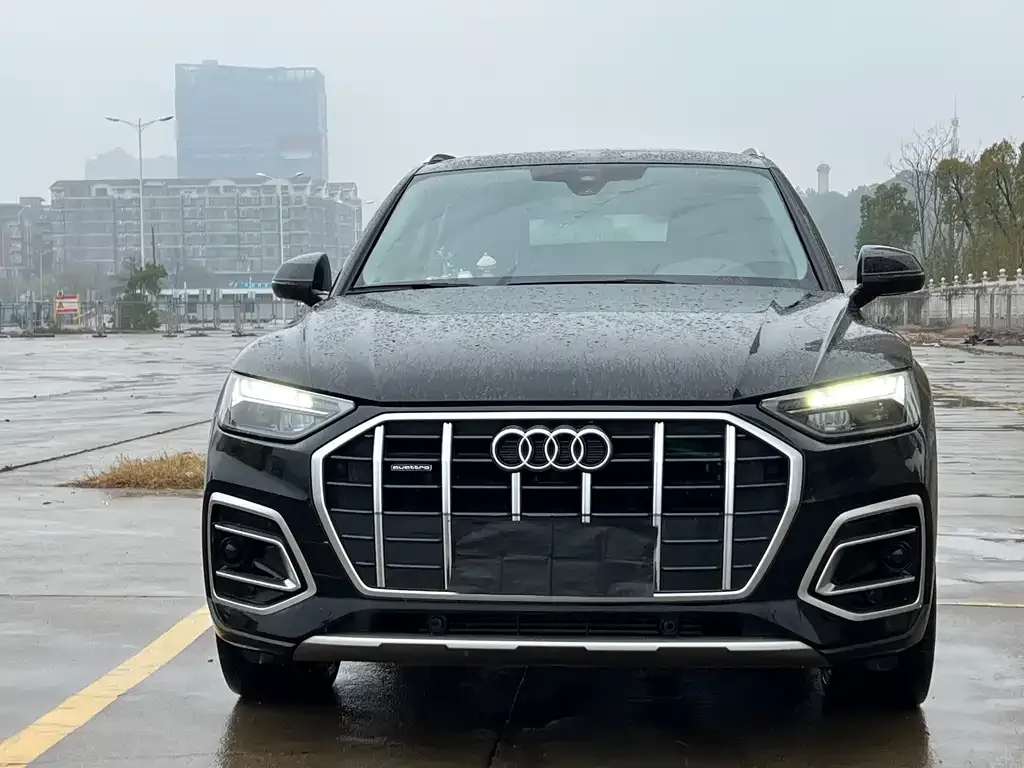 Audi Q5L — фото 5