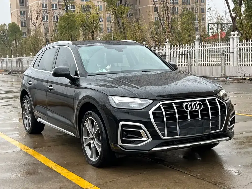 Audi Q5L — фото 7