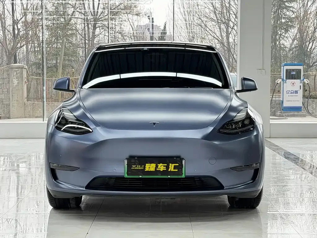 Tesla Model Y — фото 10