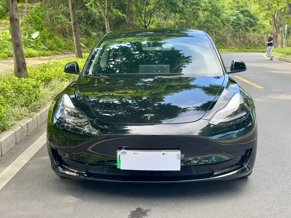 Tesla Model 3 — фото 9