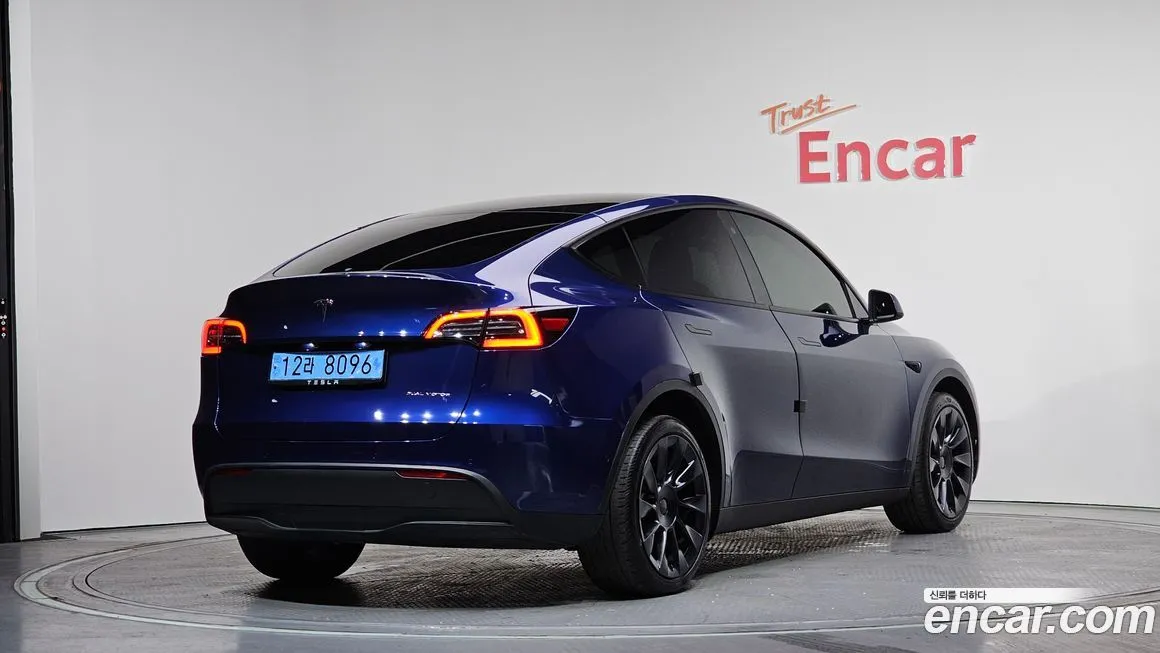 Tesla Model Y — фото 9