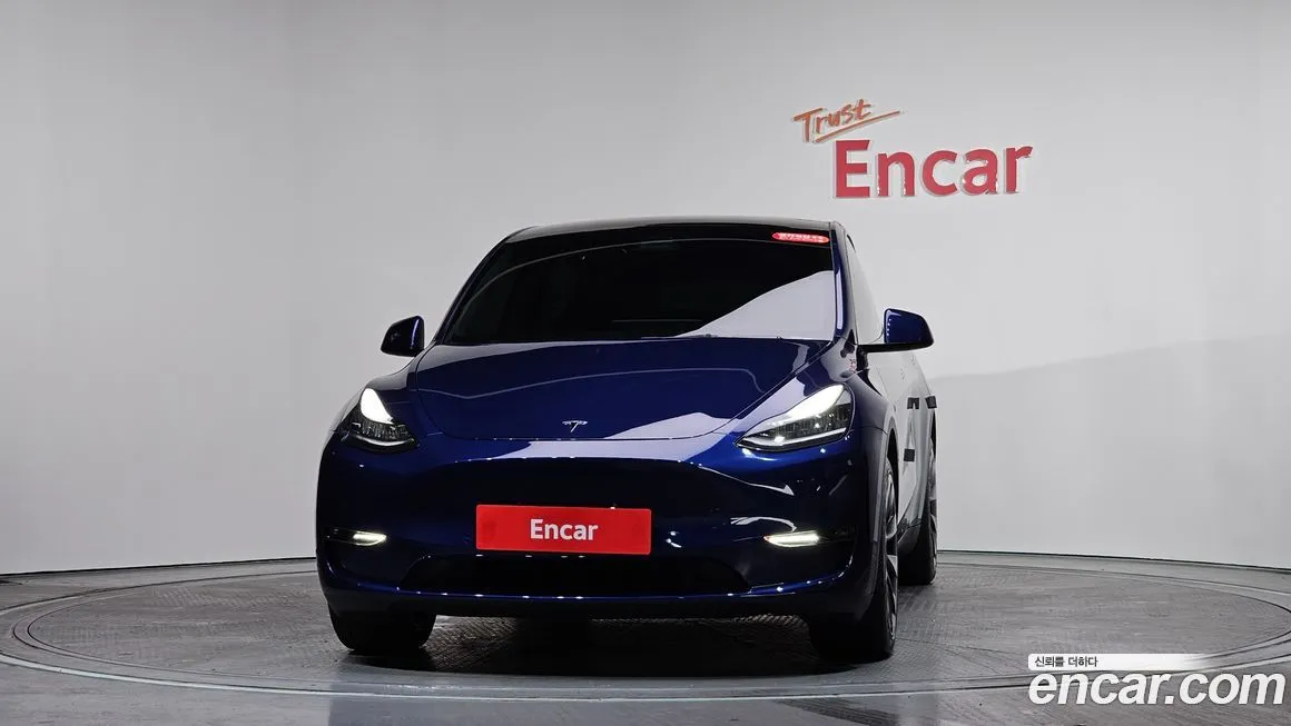 Tesla Model Y — фото 10