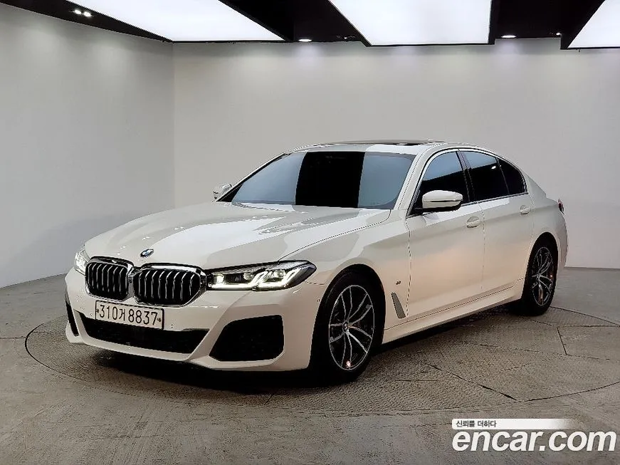 BMW 5-Series — фото 1
