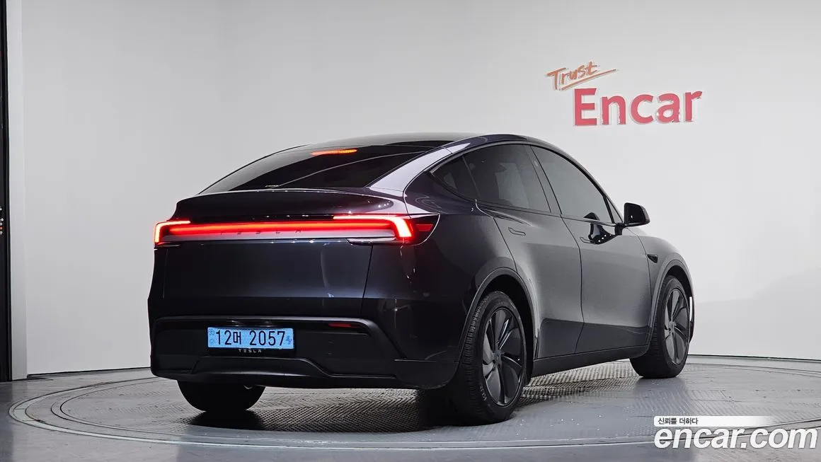 Tesla Model Y — фото 6