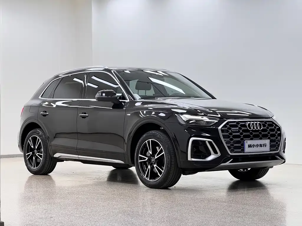 Audi Q5L — фото 10