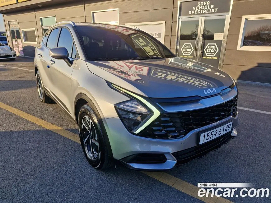 Kia Sportage — фото 10