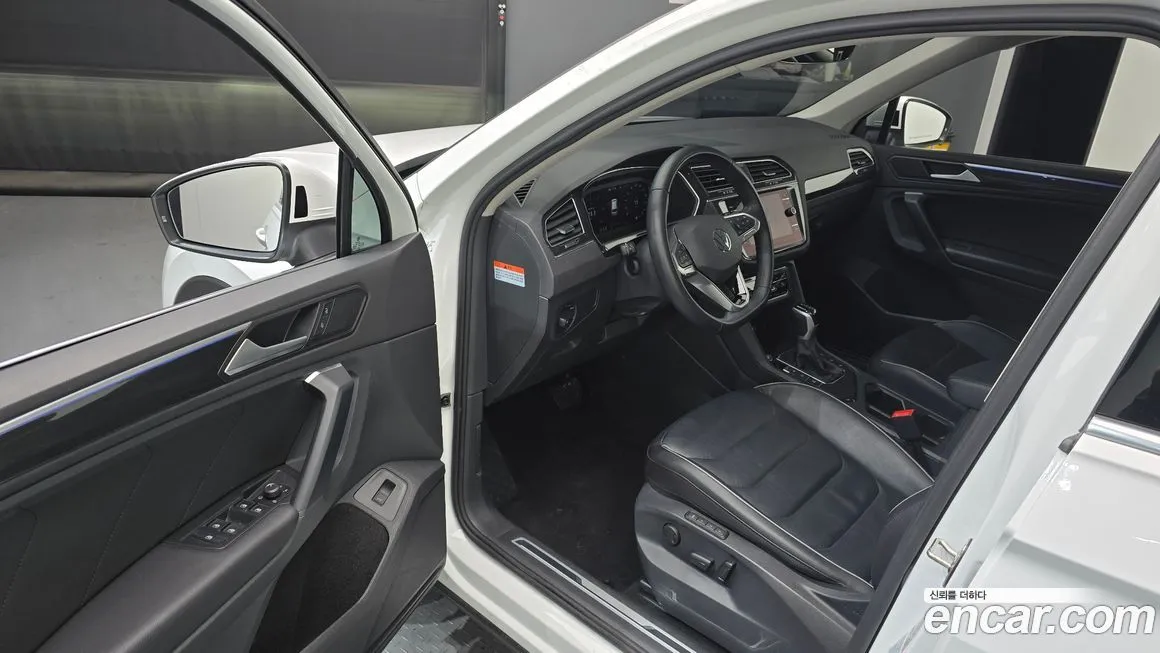 Volkswagen Tiguan — фото 10