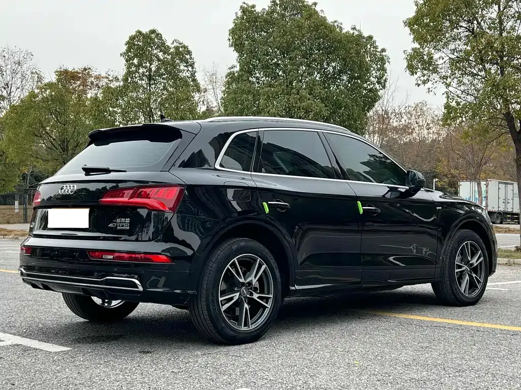 Audi Q5L — фото 7