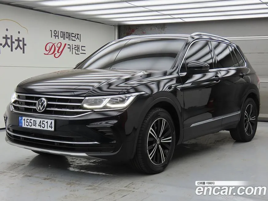 Volkswagen Tiguan — фото 1