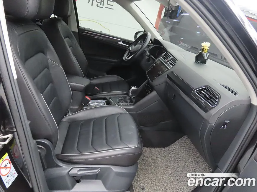 Volkswagen Tiguan — фото 10
