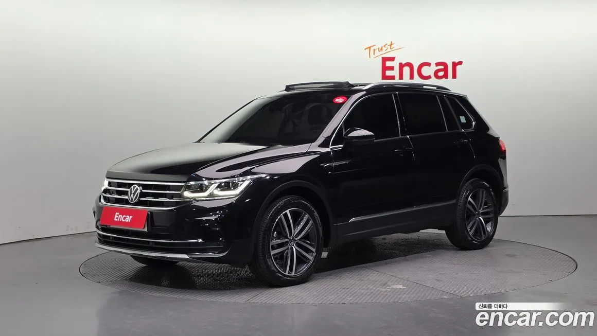 Volkswagen Tiguan — фото 1