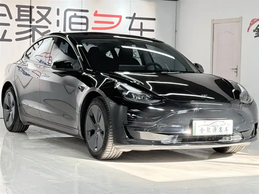 Tesla Model 3 — фото 8