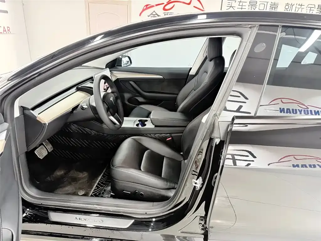Tesla Model 3 — фото 10