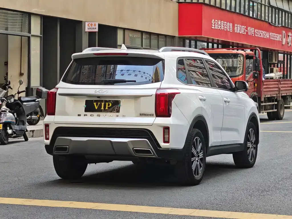 Kia Sportage — фото 7
