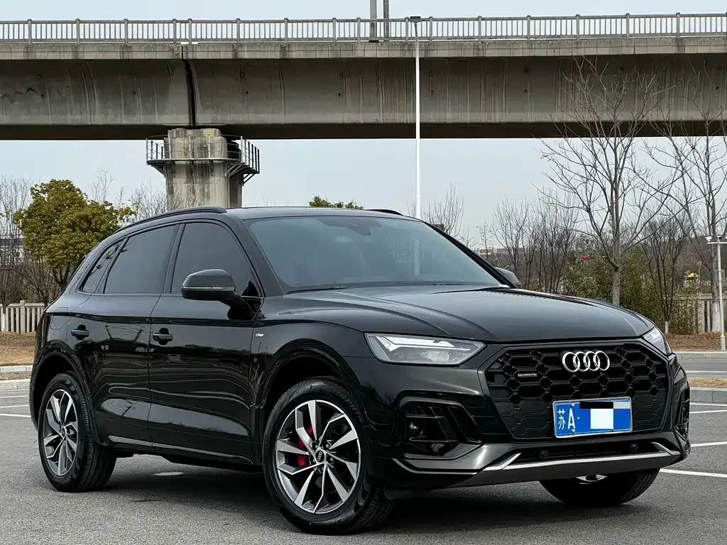 Audi Q5L — фото 7