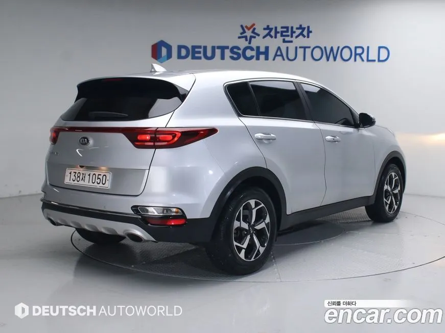Kia Sportage — фото 10