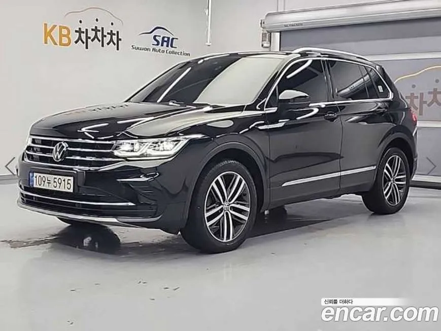 Volkswagen Tiguan — фото 1