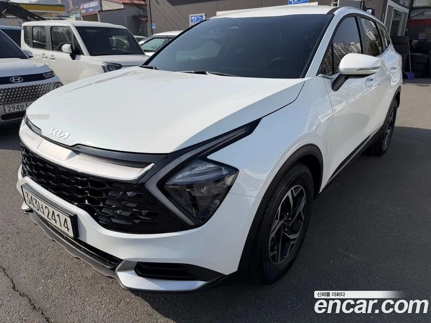 Kia Sportage — фото 1