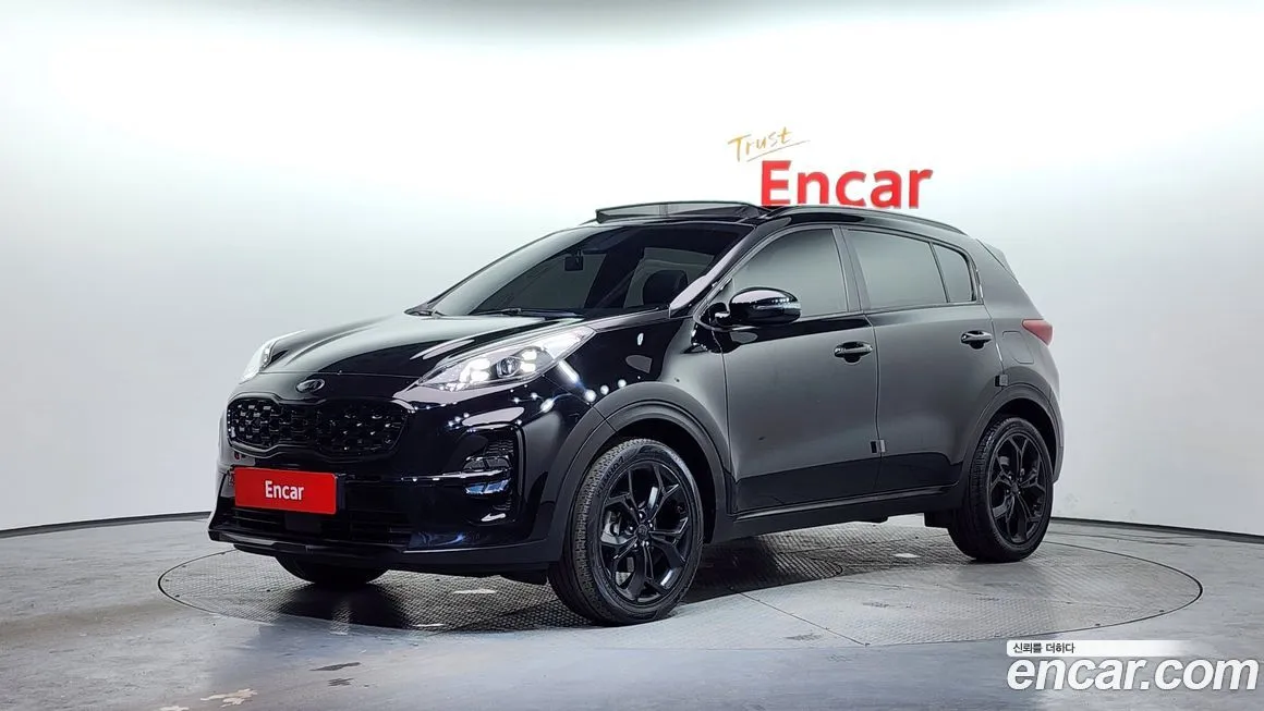 Kia Sportage — фото 1