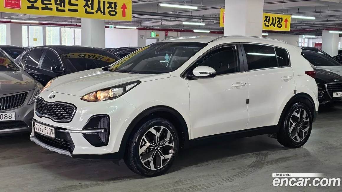 Kia Sportage — фото 1
