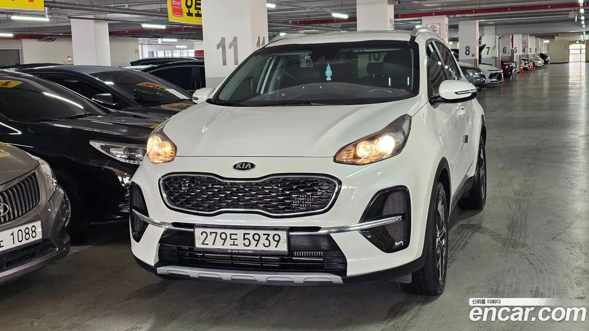 Kia Sportage — фото 6