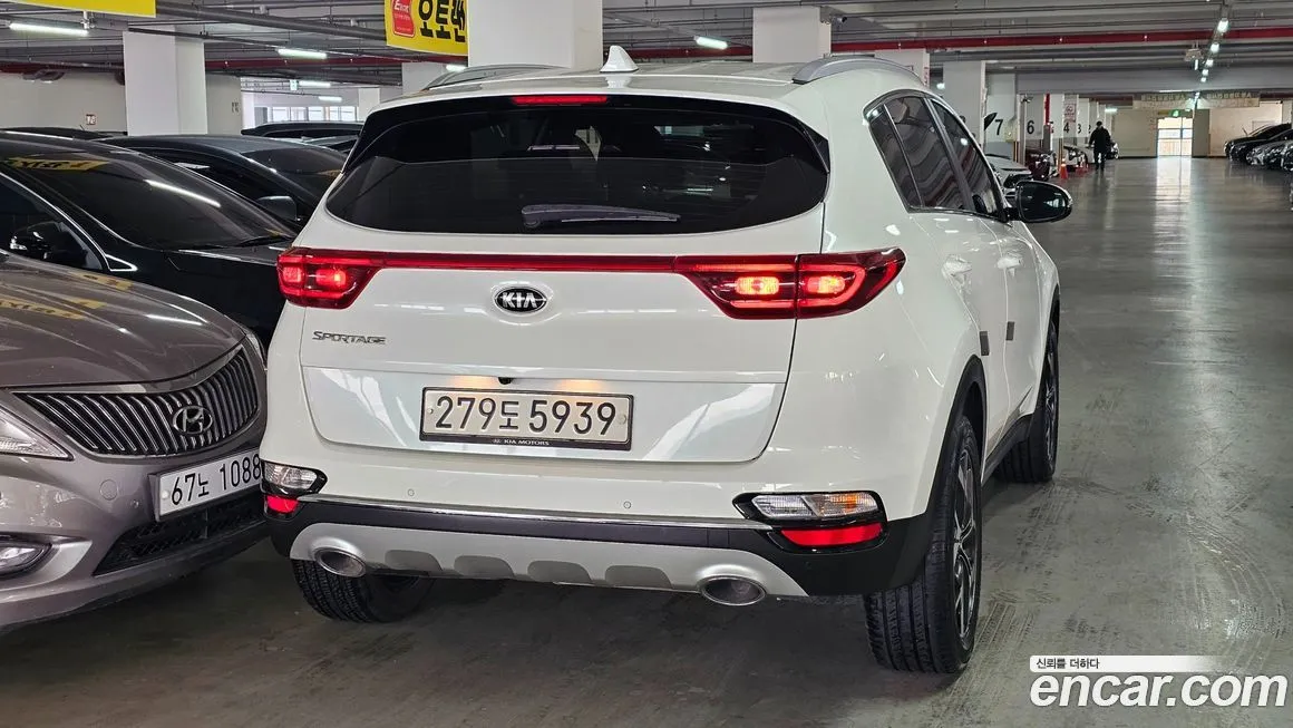 Kia Sportage — фото 9