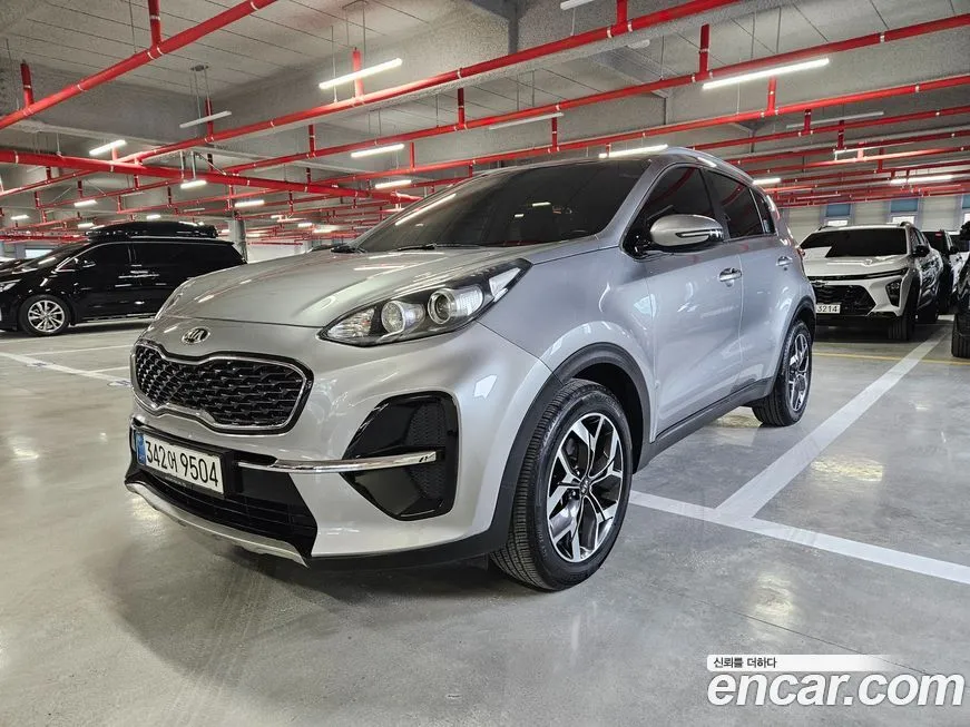 Kia Sportage — фото 1