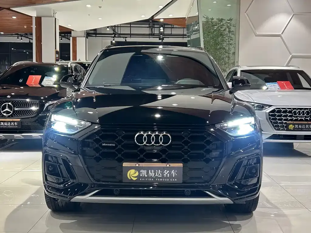 Audi Q5L — фото 10