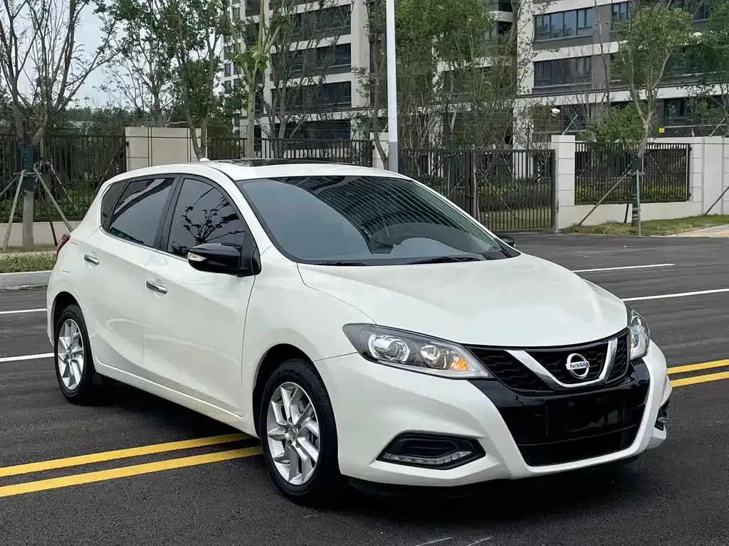 Nissan Tiida — фото 9