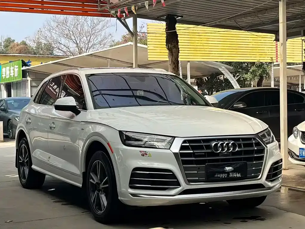 Audi Q5L — фото 5