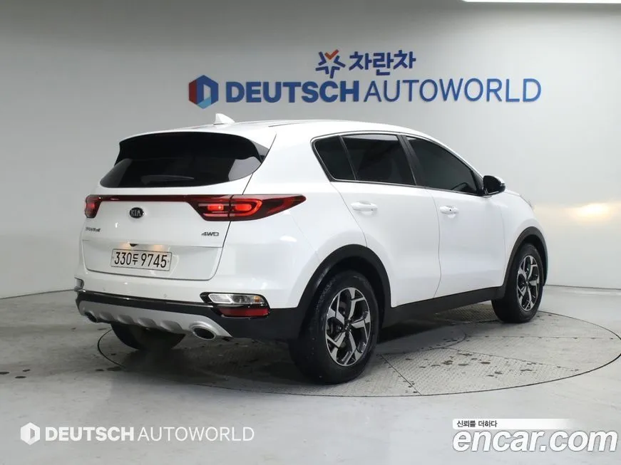 Kia Sportage — фото 7