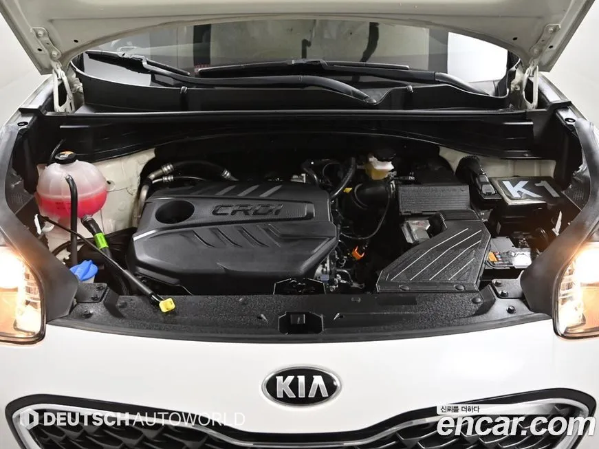 Kia Sportage — фото 10