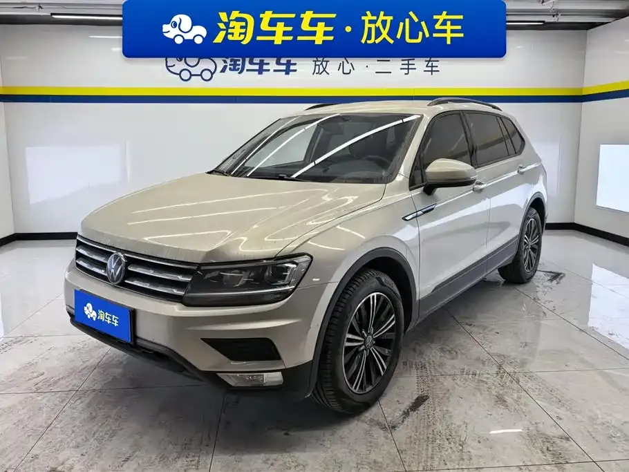 Volkswagen Tiguan L — фото 1