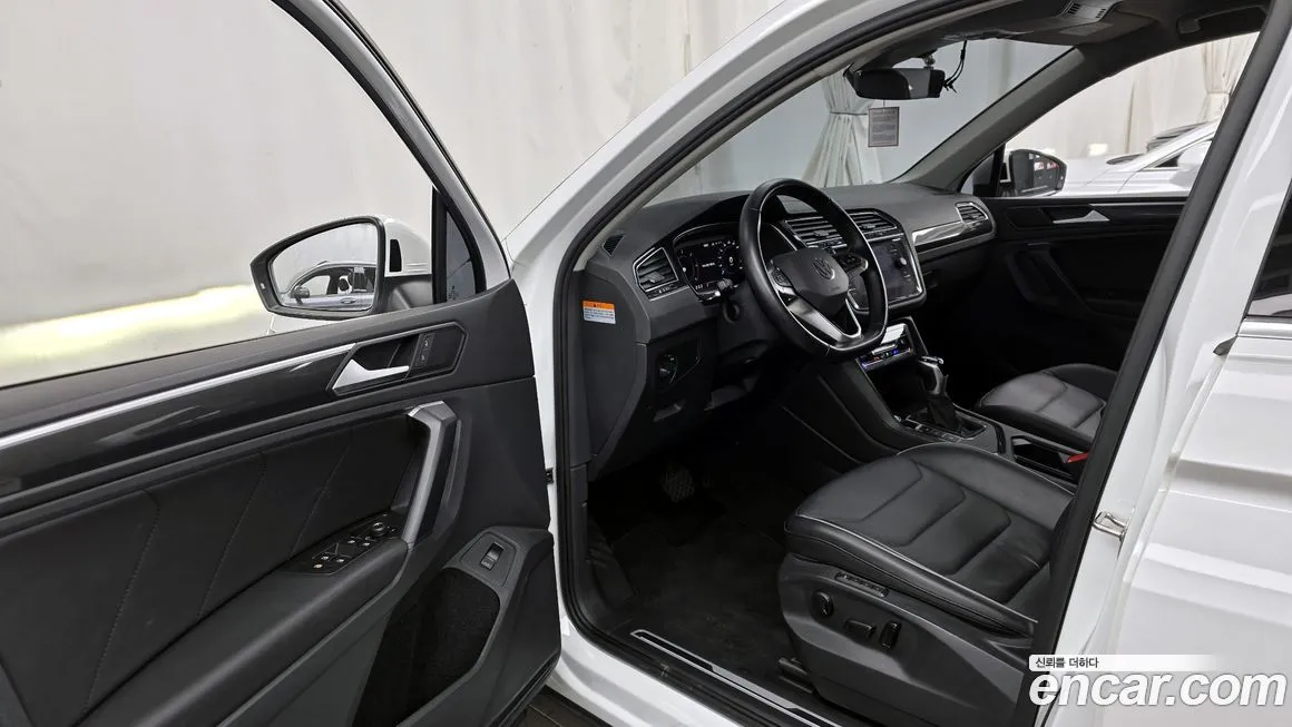 Volkswagen Tiguan — фото 10