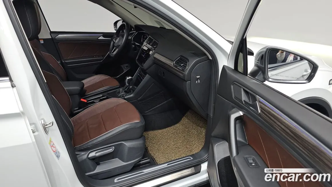 Volkswagen Tiguan — фото 10
