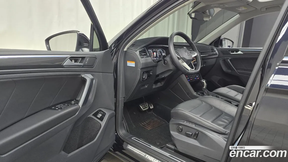 Volkswagen Tiguan — фото 10