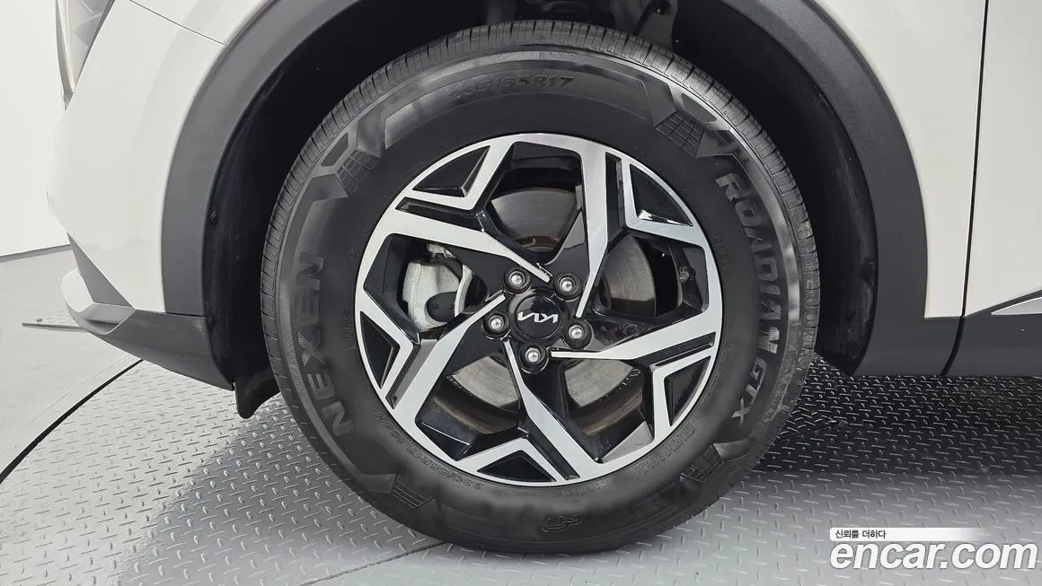 Kia Sportage — фото 7