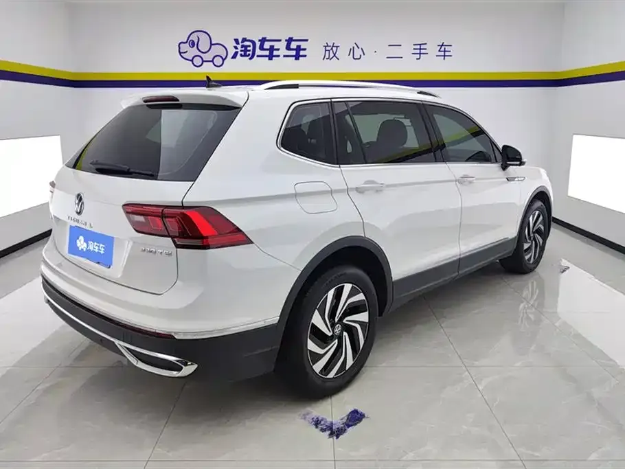 Volkswagen Tiguan L — фото 2