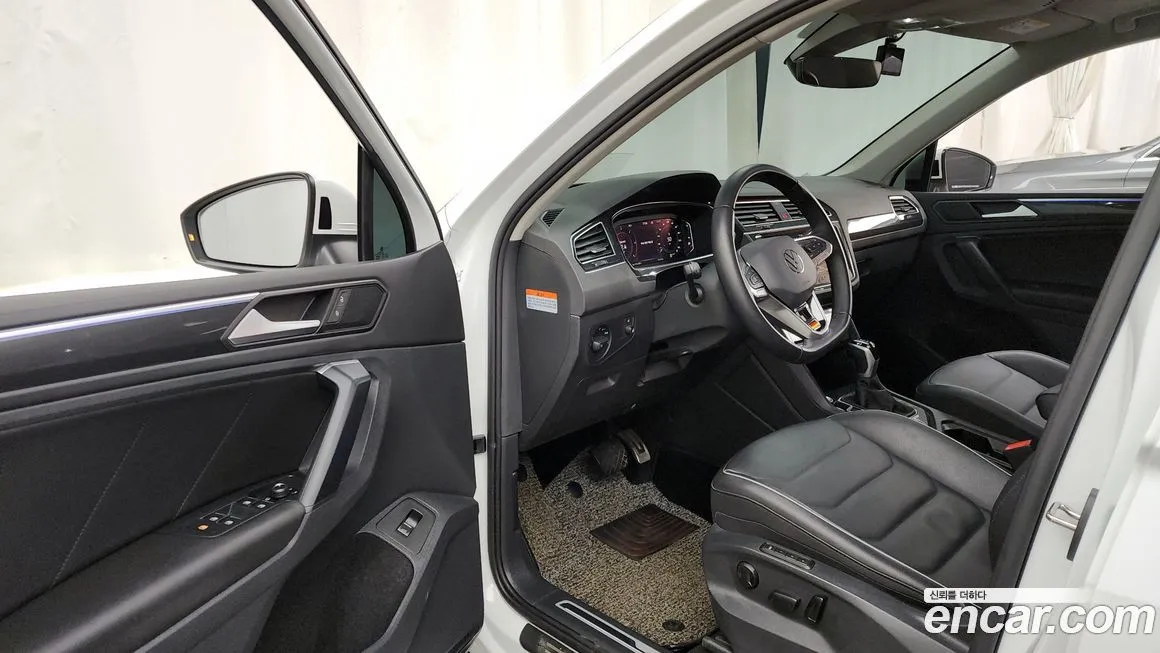 Volkswagen Tiguan — фото 9