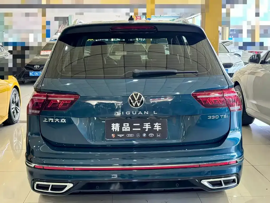 Volkswagen Tiguan L — фото 10