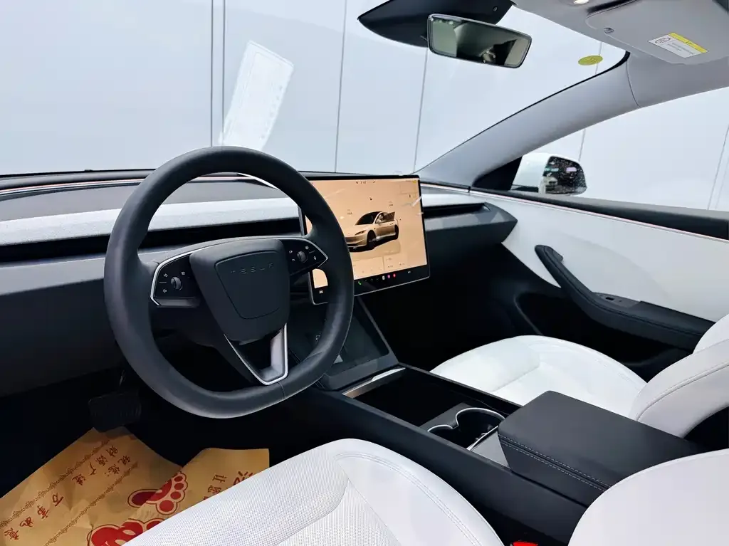 Tesla Model 3 — фото 9