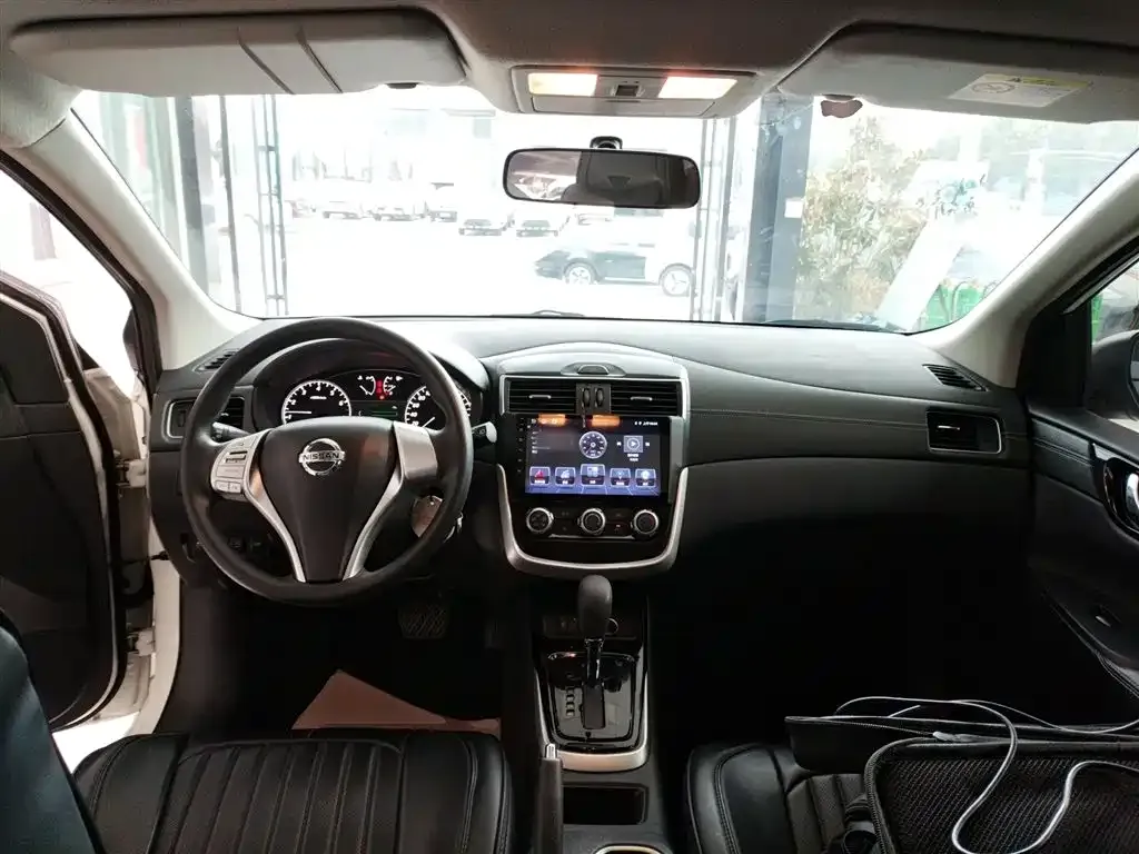 Nissan Tiida — фото 10