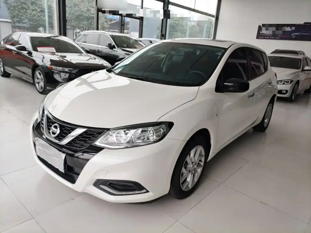 Nissan Tiida — фото 4