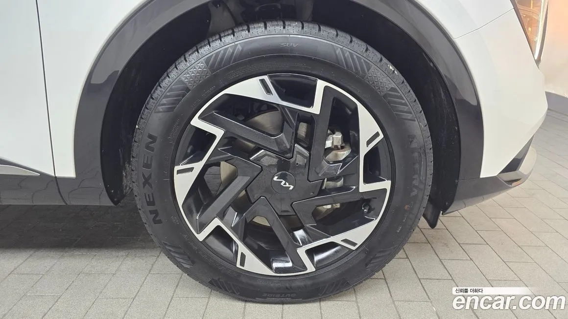 Kia Sportage — фото 10
