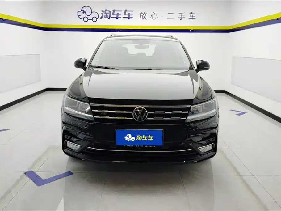 Volkswagen Tiguan L — фото 2