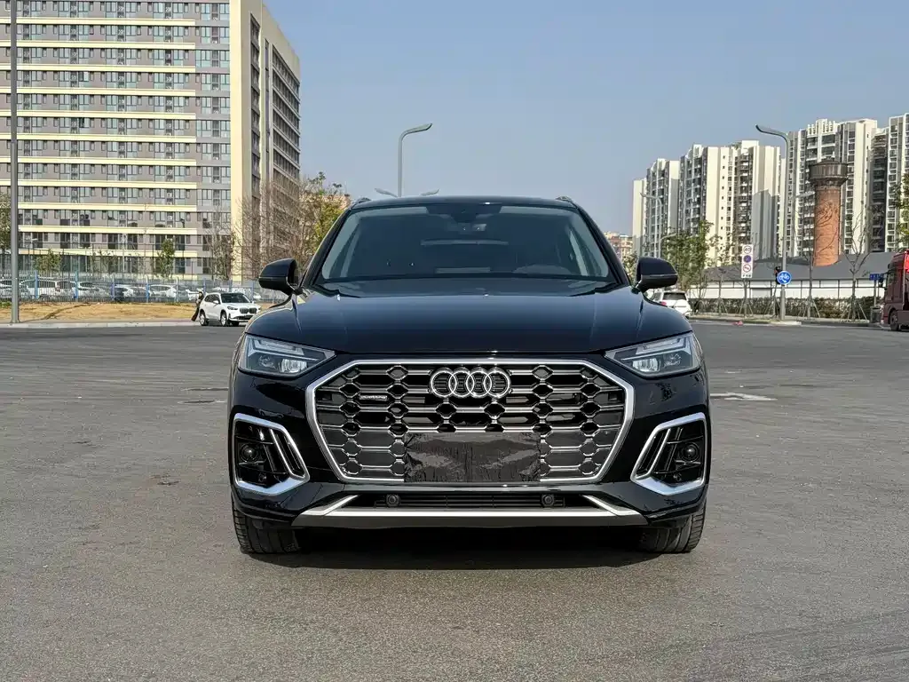 Audi Q5L — фото 6