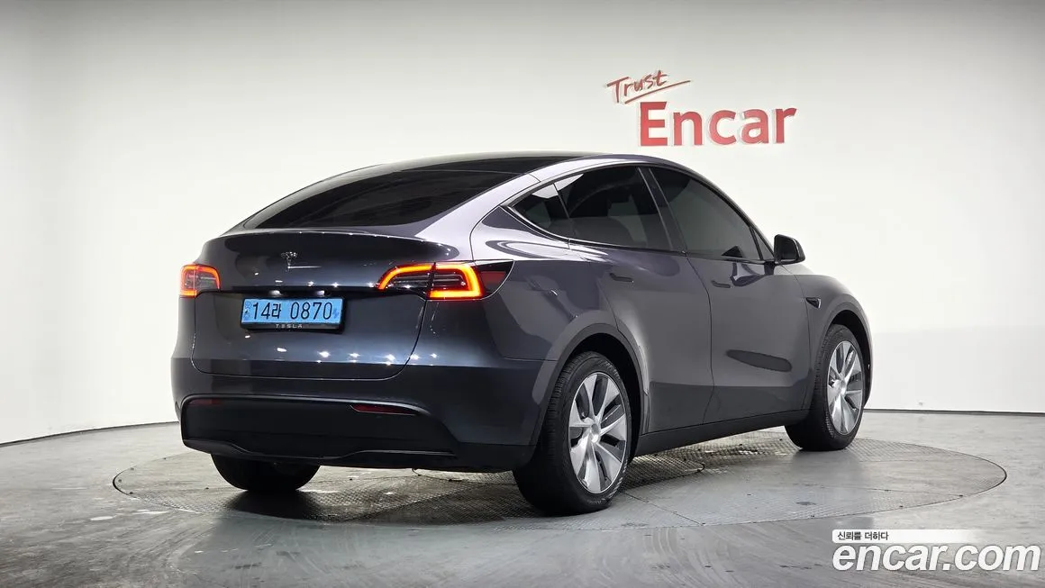 Tesla Model Y — фото 7
