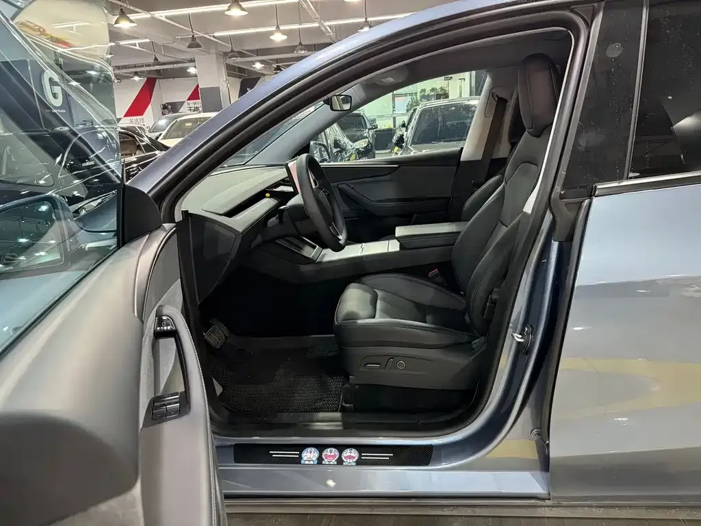 Tesla Model Y — фото 6