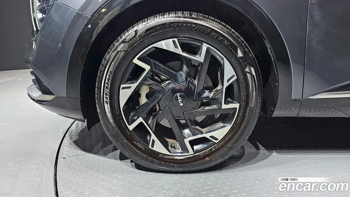 Kia Sportage — фото 10